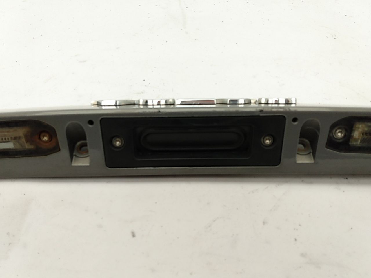 Volvo V50 License Plate Light And Trunk Latch Trim