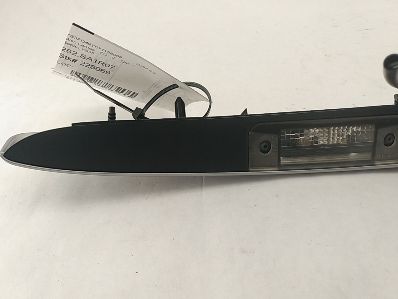 Saab 9-3 License Plate Light Trim