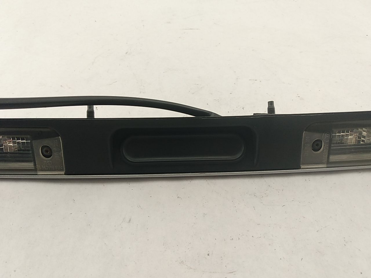 Saab 9-3 License Plate Light Trim