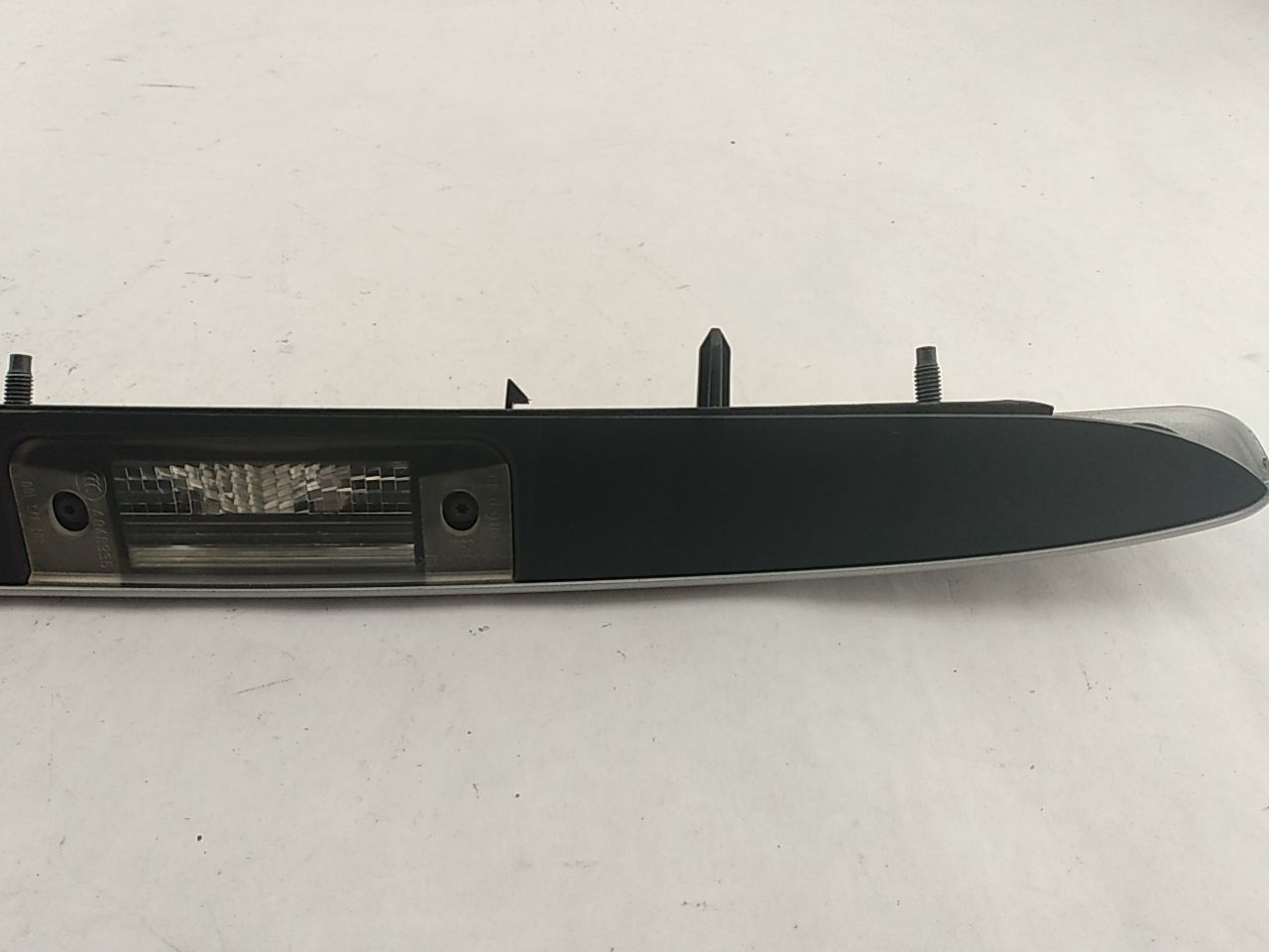 Saab 9-3 License Plate Light Trim