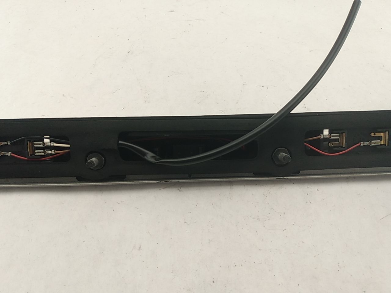 Saab 9-3 License Plate Light Trim