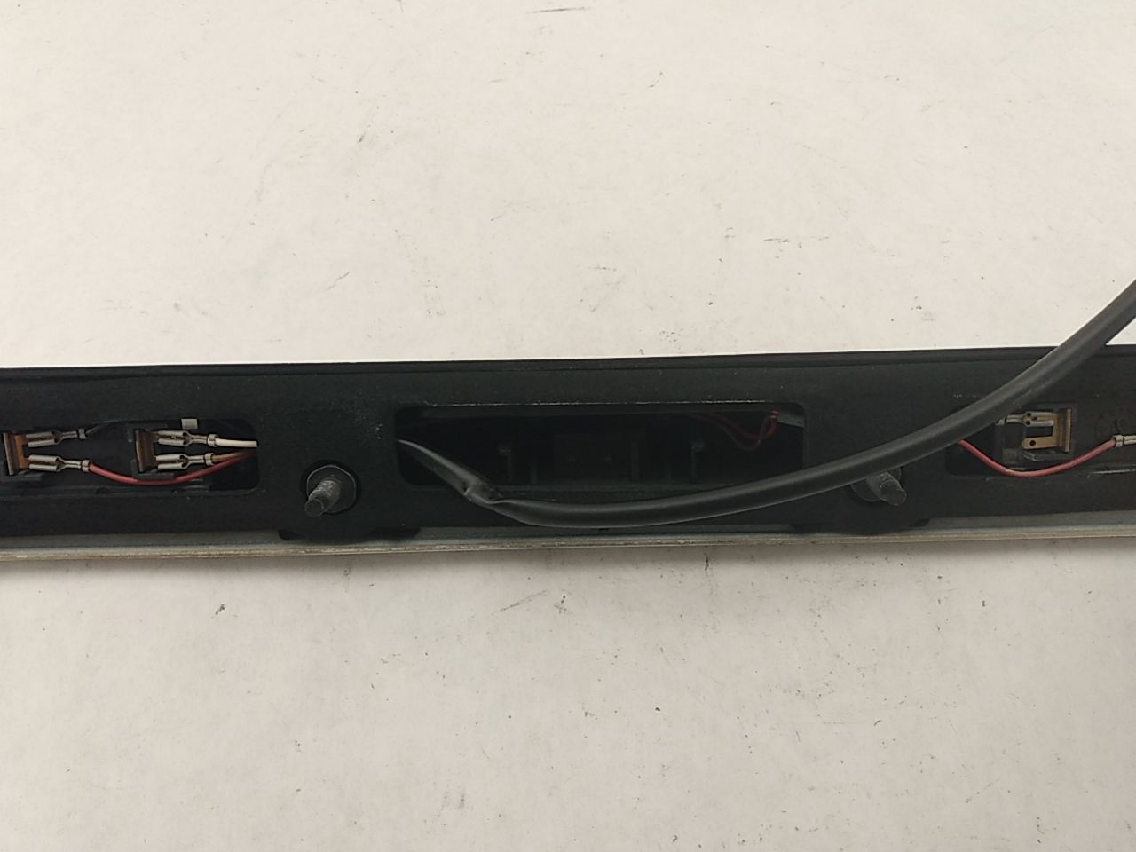 Saab 9-3 License Plate Light Trim