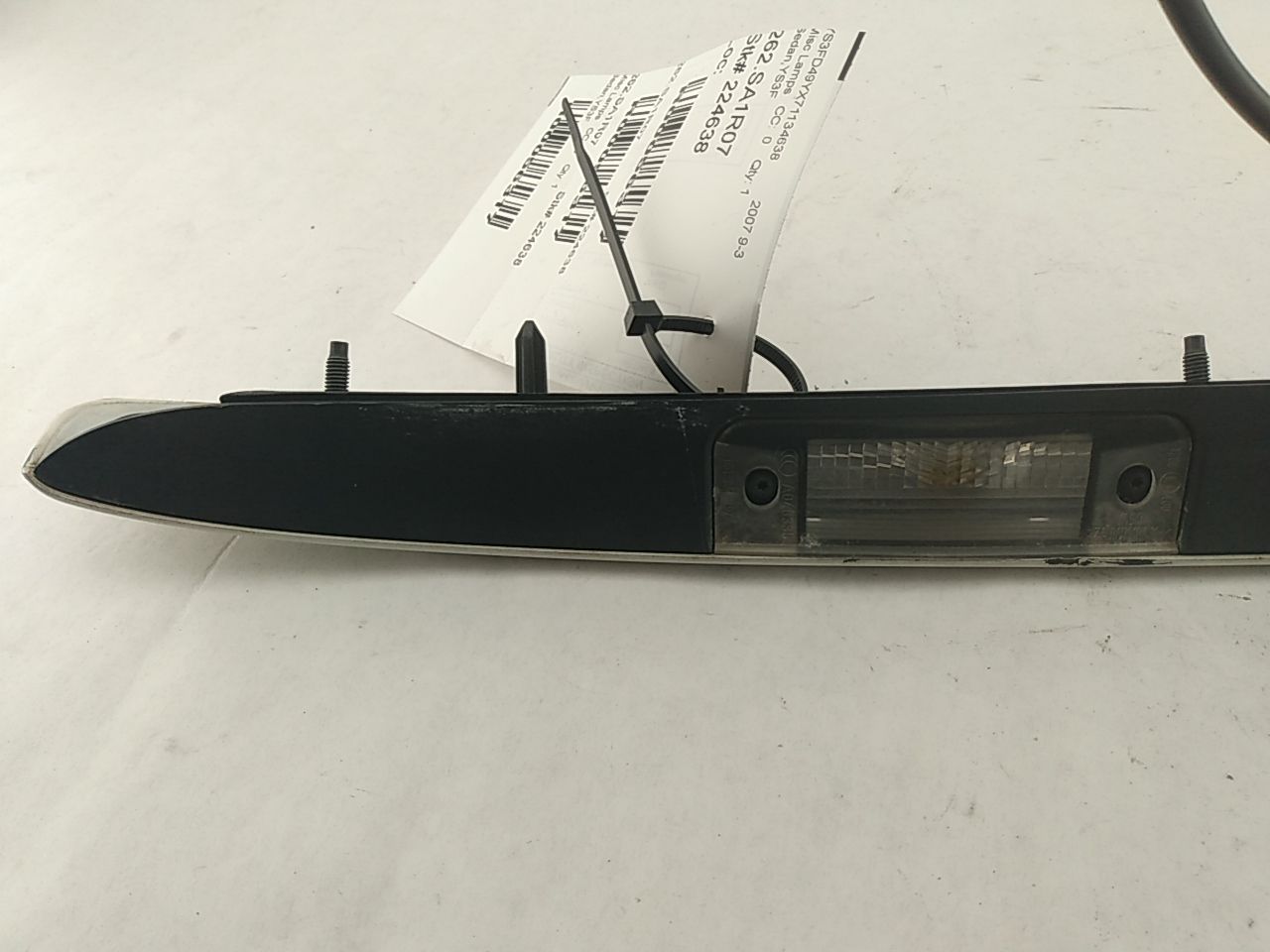 Saab 9-3 License Plate Light Trim