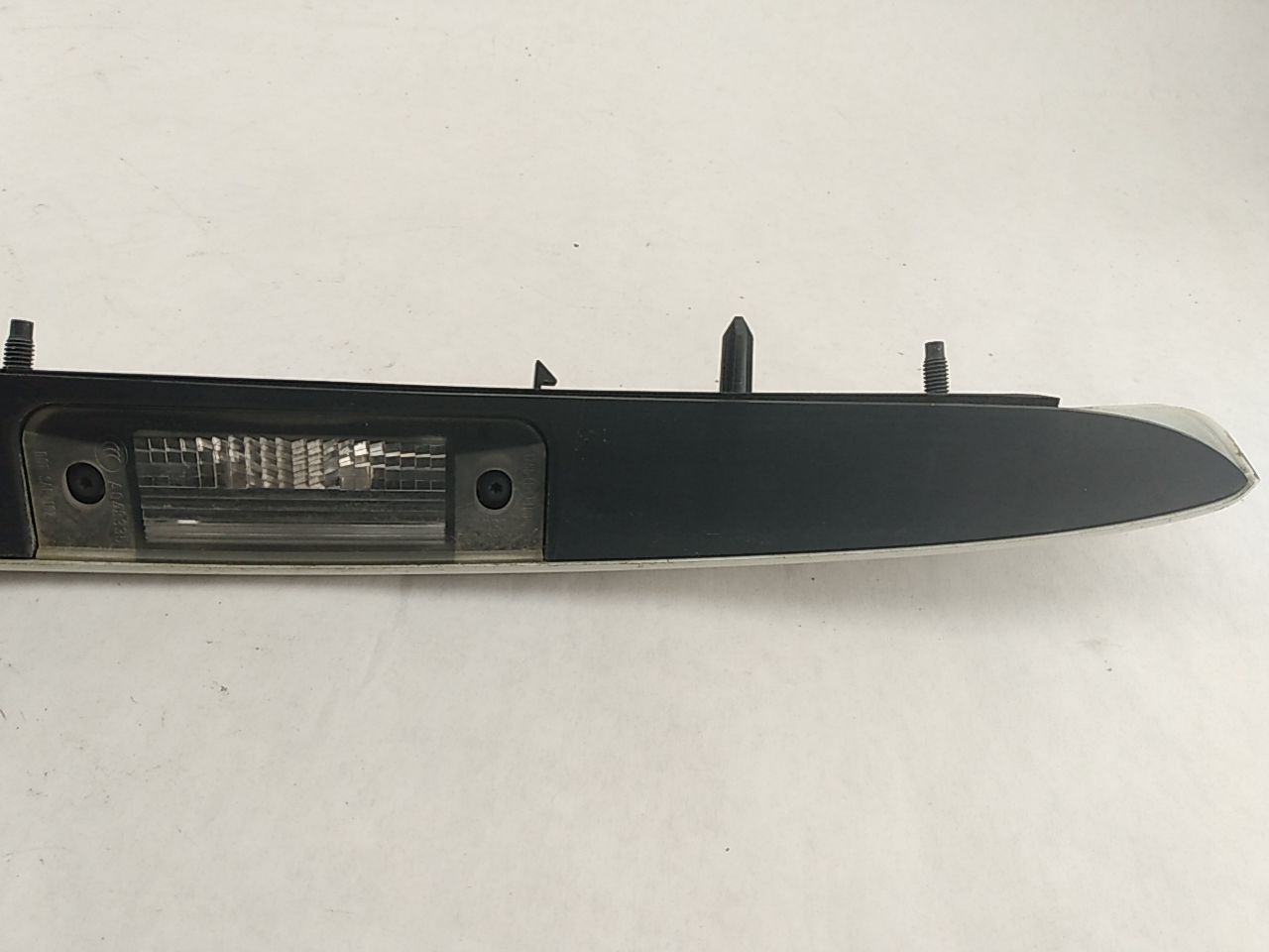 Saab 9-3 License Plate Light Trim