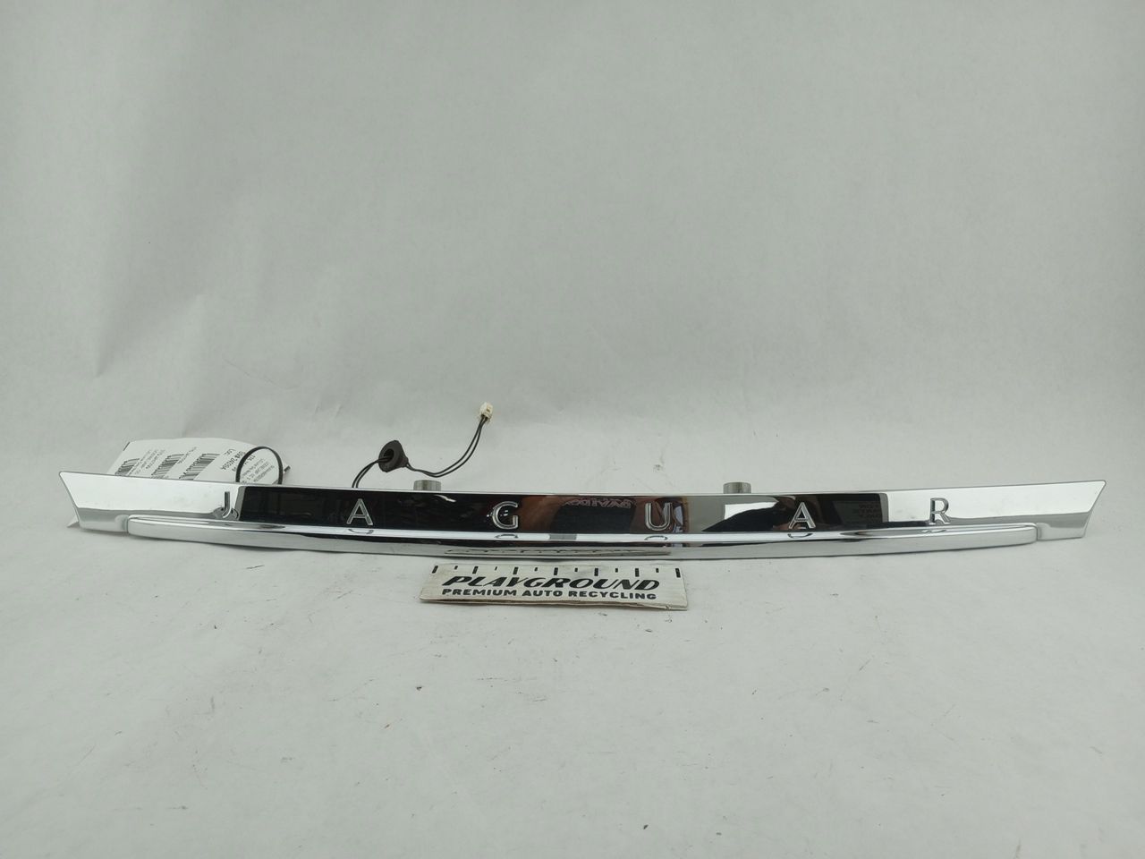 Jaguar XK Trunk Mounted License Plate Light Chrome Trim Panel